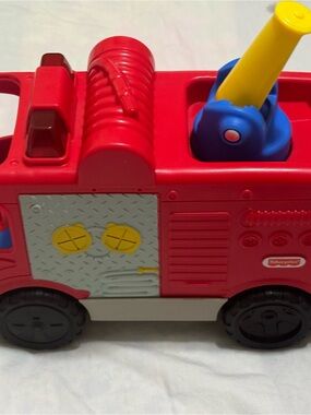 Fisher-Price Little PeopleRed Fire Rescue Truck Toy with Yellow and Blue Accents